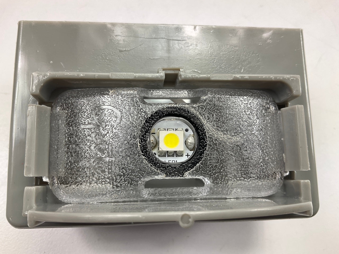 Grote 60681 MicroNova Multi-Volt LED License Light, Vertical Mount, Gray