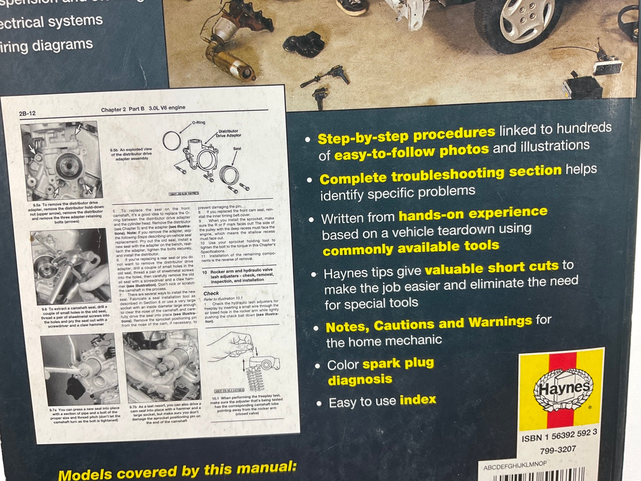 OPENED - Haynes 54070 Repair Manual For 1994-2001 Kia Sephia, 2000-04 Spectra