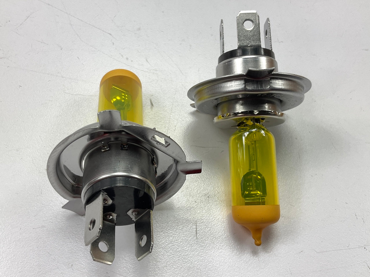 Hella H71070682 H4 Light Bulbs (PAIR) - Extreme YELLOW XY, 12V, 55W, Halogen