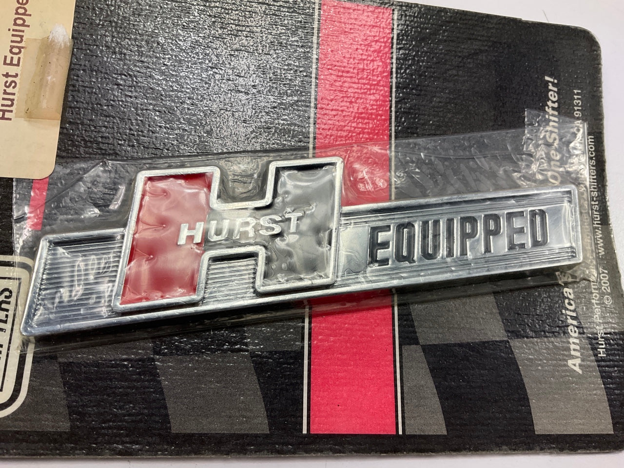 Hurst 1361000 Emblem - ''Hurst Equipped'' Emblem, Adhesive, Chrome Plastic