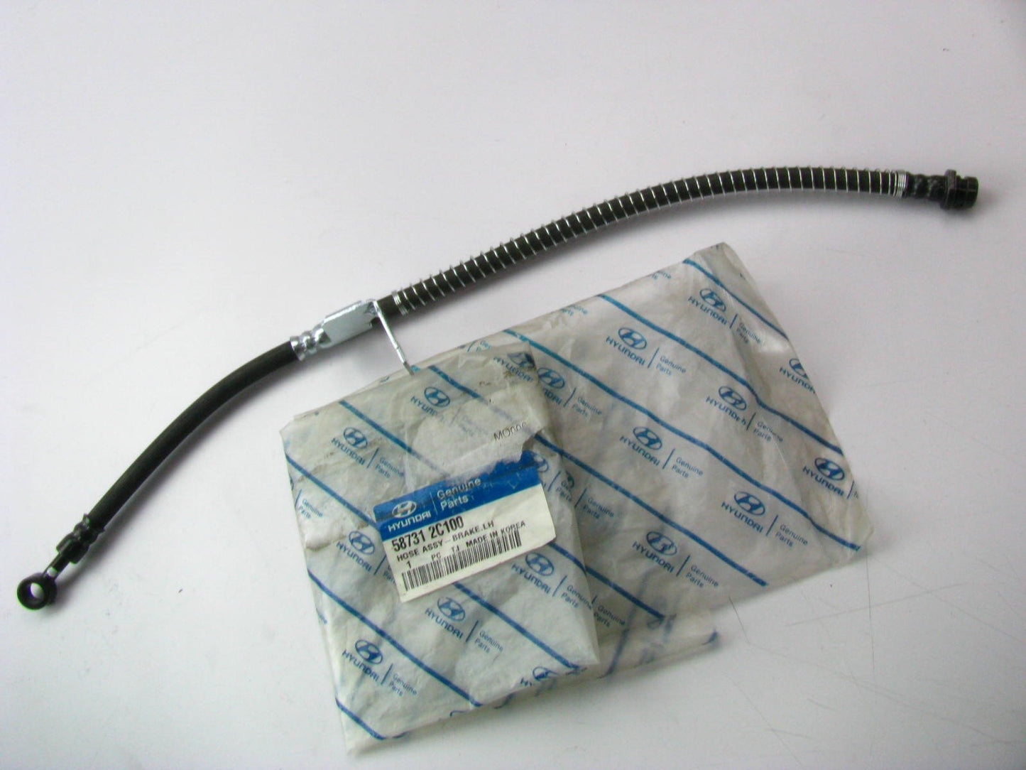 New Genuine FRONT LEFT Brake Hose OEM For 2003-2008 Tiburon 587312C100