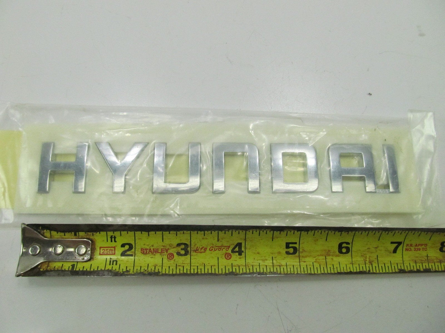NEW - OEM Rear Tailgate Emblem For 06-08 Hyundai Entourage 863124J000 (HYUNDAI)