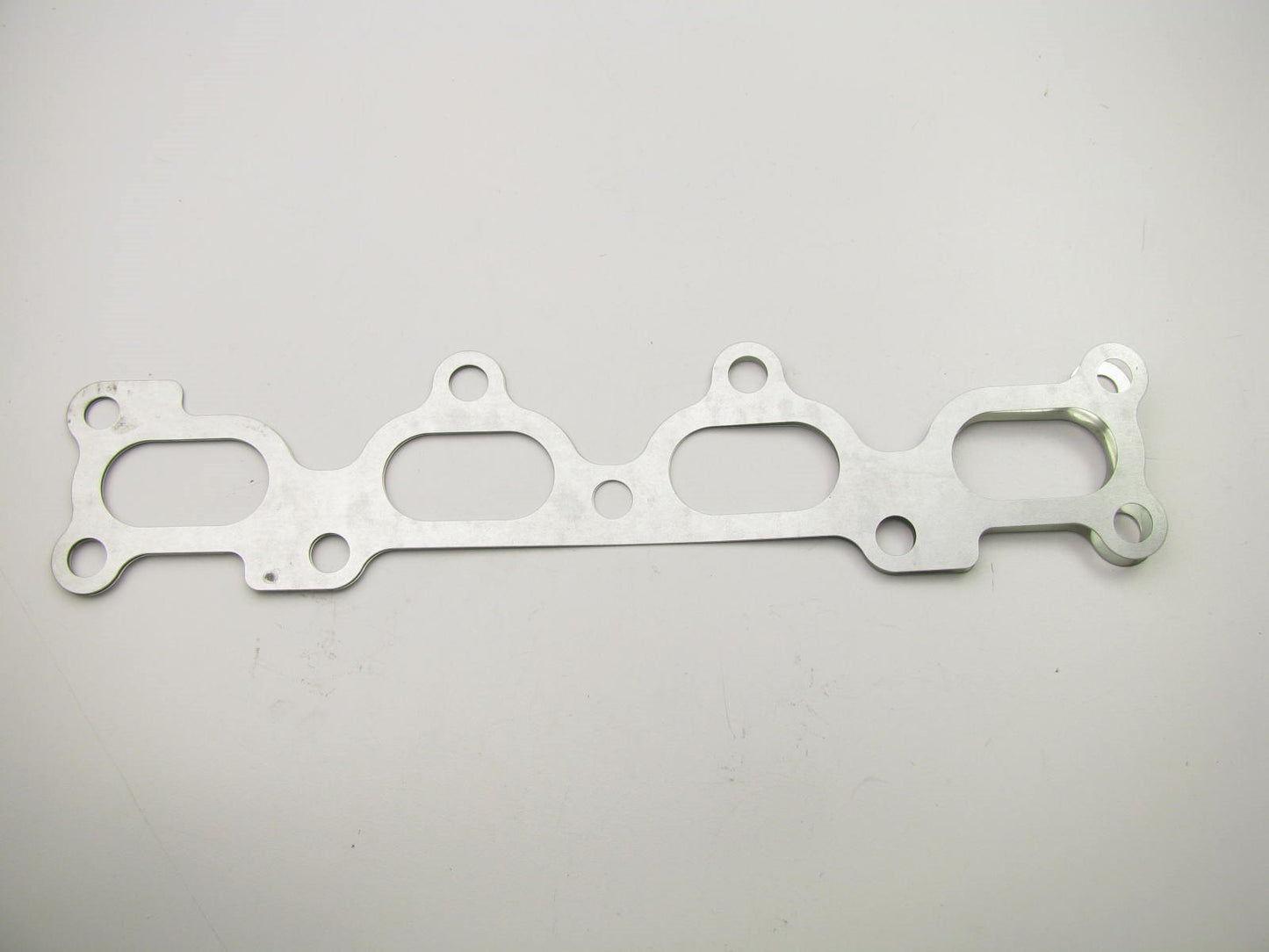 NEW GENUINE Exhaust Manifold Gasket OEM FOR 95-97 KIA Sephia 0K20313460