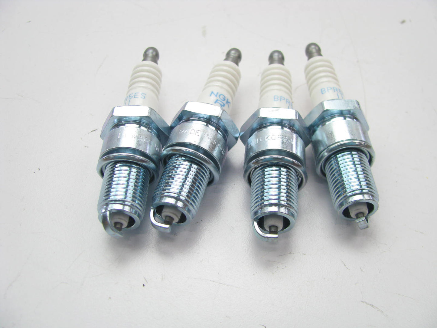 (4) NEW - OEM 0K20W18110 NGK BPR5ES11 Spark Plugs For 1994-2006 Kia 2.4L-L4