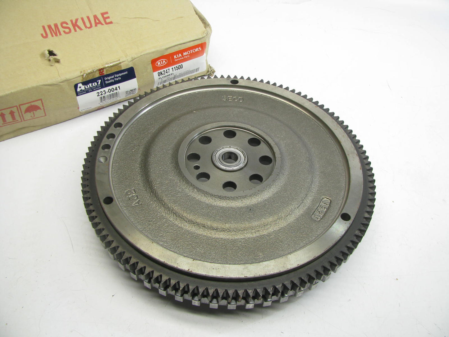 NEW - OEM 0K24711500 Clutch Flywheel For 1997-2001 Kia Sephia, 2000-2004 Spectra