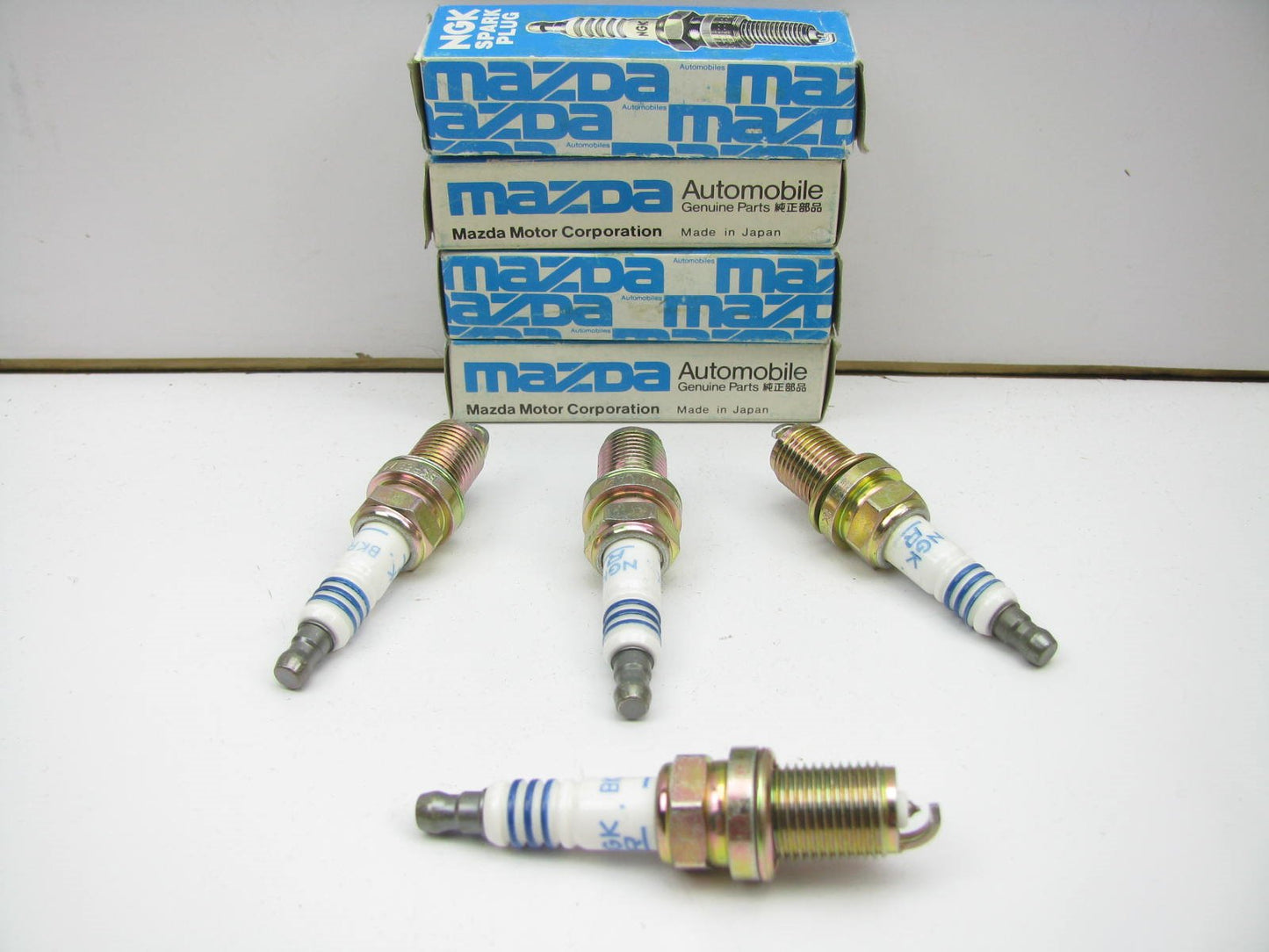 (4) NEW - OEM Mazda 0000-18-JE41 Ignition Spark Plugs NGK BKR5EVX-11