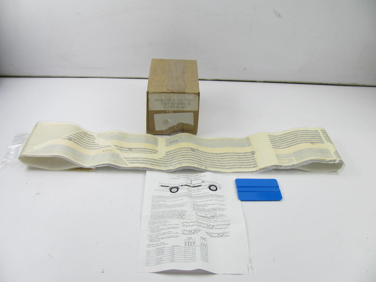 NOS OEM Mazda RH 4X2 Silver And Black Side Stripe Kit 0000-88-0908-SB