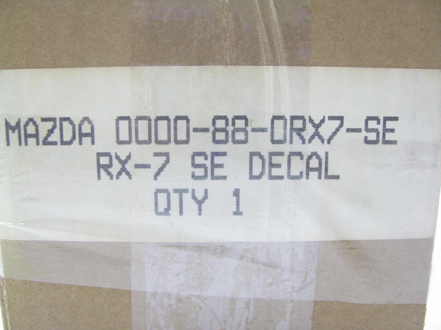 NOS OEM Mazda RX-7 SE Limited ''SE'' Sticker Badge NEW OLD STOCK OEM 0000880RX7SE