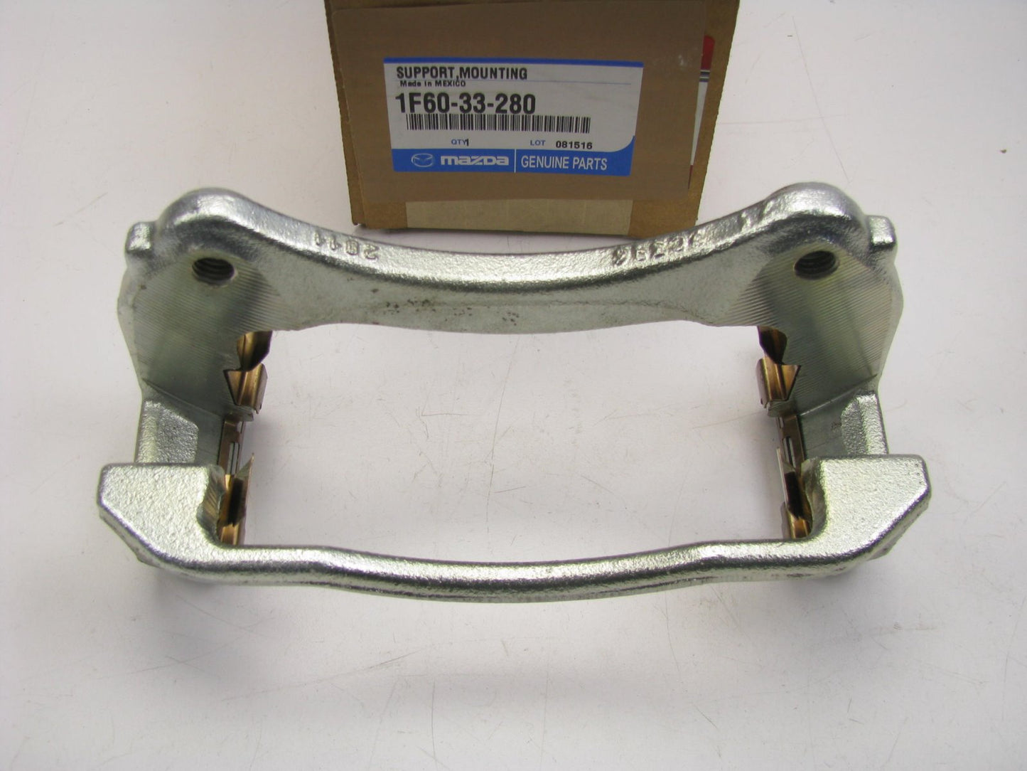 NEW - OEM Mazda 1F60-33-280 Disc Brake Caliper Mounting Bracket - Front