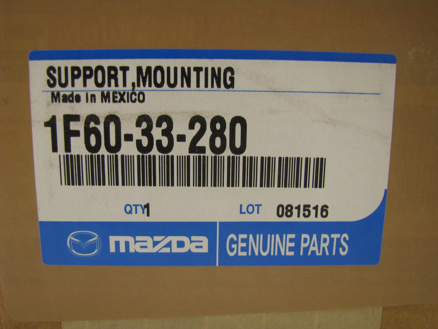 NEW - OEM Mazda 1F60-33-280 Disc Brake Caliper Mounting Bracket - Front
