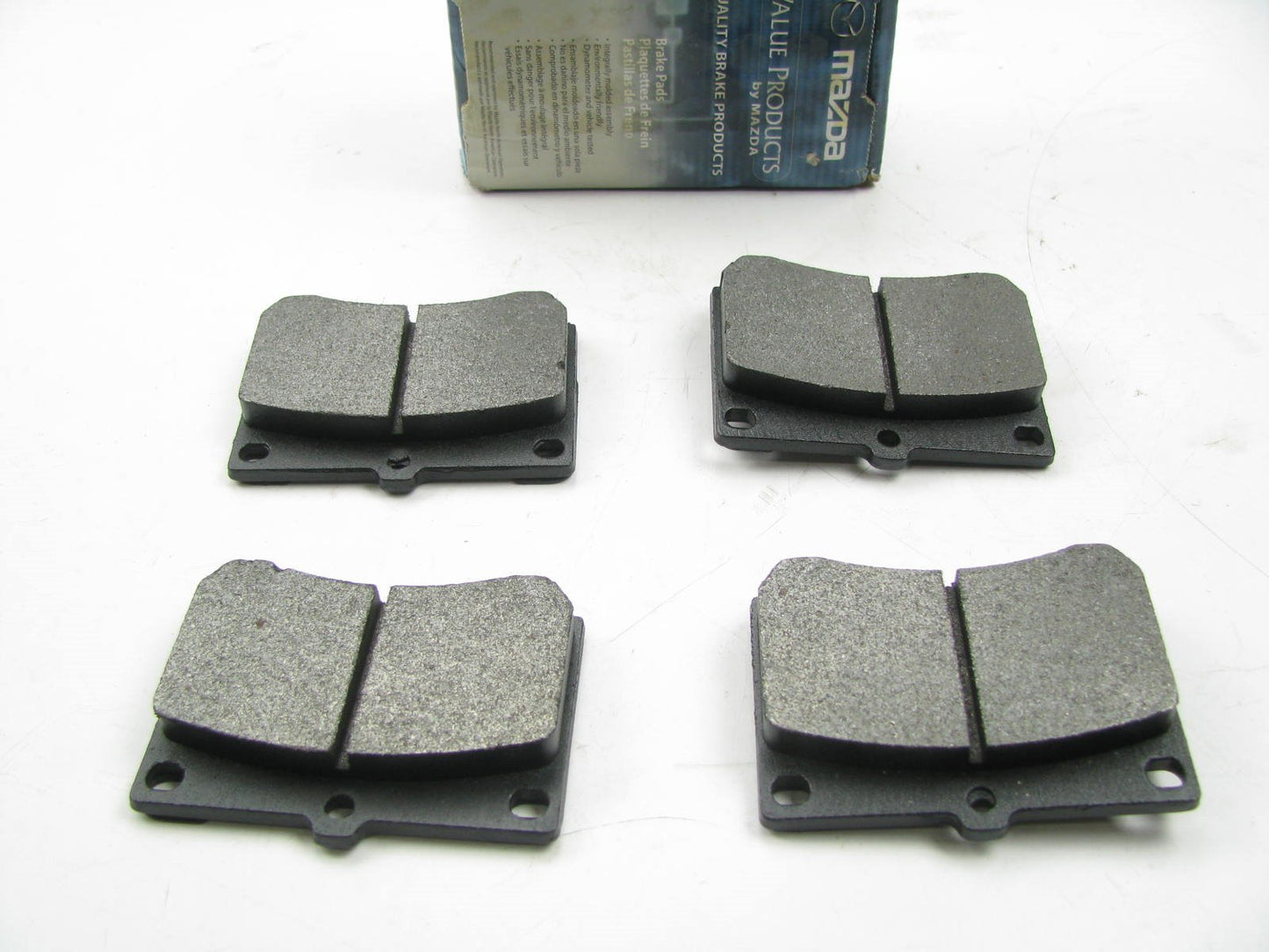 NEW - OEM B0YW3328ZAMV Mazda FRONT Disc Brake Pads
