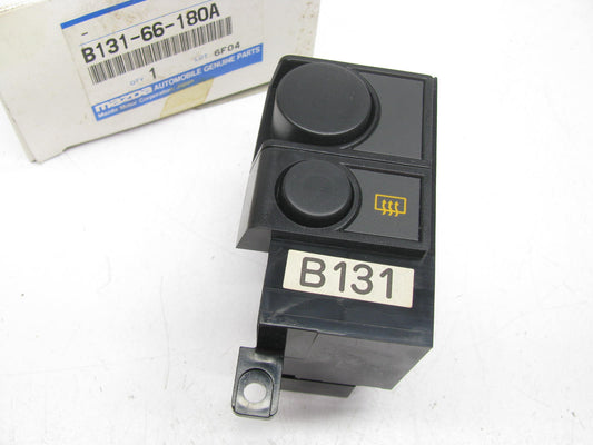 NOS - OEM Mazda B131-66-180A Rear Defogger Switch 1986-1989 323