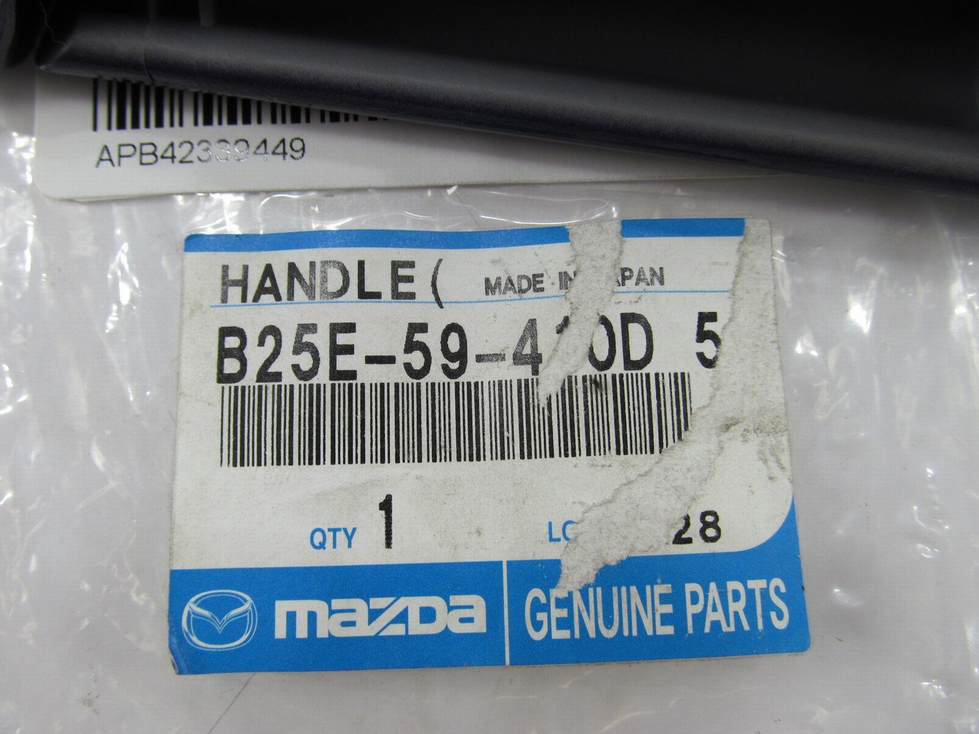 NEW - OEM B25E59410D50 SUPREME BLUE Front Left Door Handle 1999-00 Mazda Protege