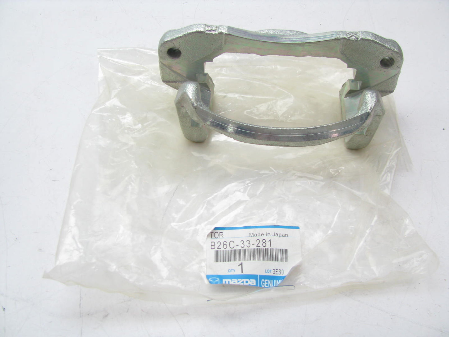 New Genuine OEM Mazda Front Disc Brake Caliper Bracket 99-01 Protege B26C33281