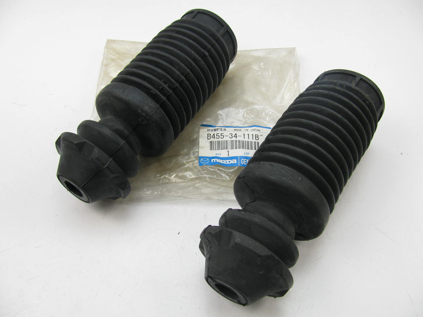 (2) NEW Front Shock Absorber Dust Covers OEM Mazda 90-94 323 Protege, 92-95 MX-3