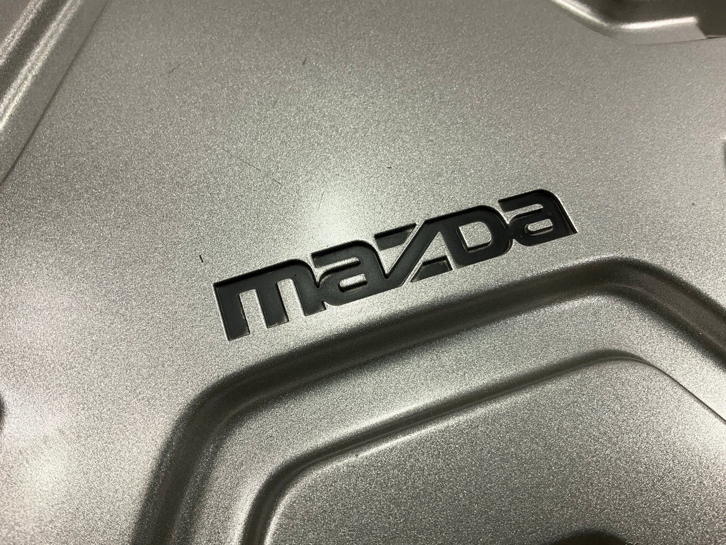 NOS OEM Mazda BA4737190 Wheel Hub Cap - 1981-1982 Mazda GLC 13'' Wheel Cover