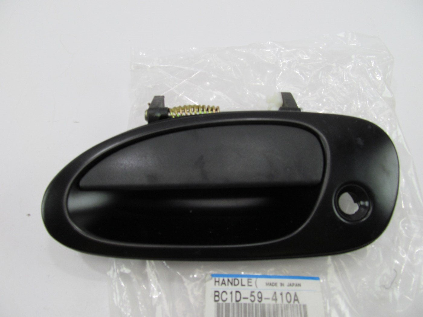 NEW GENUINE Front Left Drivers Side Exterior Door Handle  1997-98 Mazda Protege