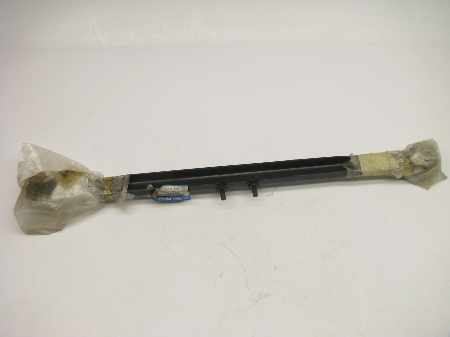 NEW - OEM BJ0E-28-250-A Rear Left Trailing Arm For 99-00 Mazda Protege