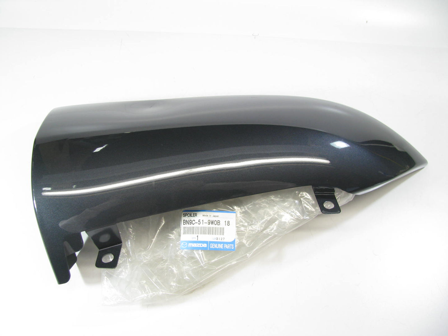 New OEM Rear Bumper Face Bar Left Side Filler Retainer Trim - 2004-2006 Mazda 3