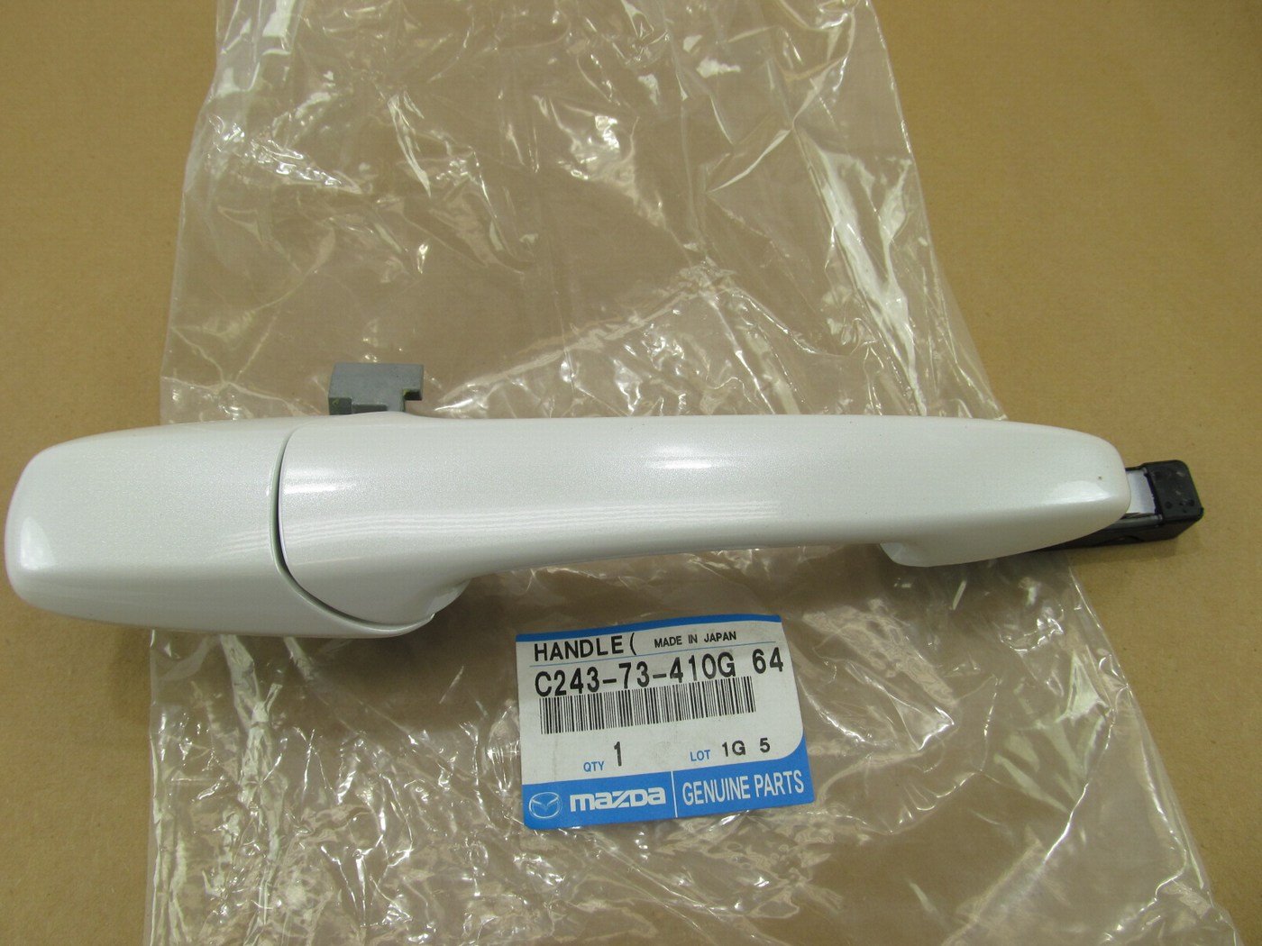 NEW - OEM C24373410G64 Rear Left Outside Door Handle 2006-2007 Mazda 5 SNOWFLAKE