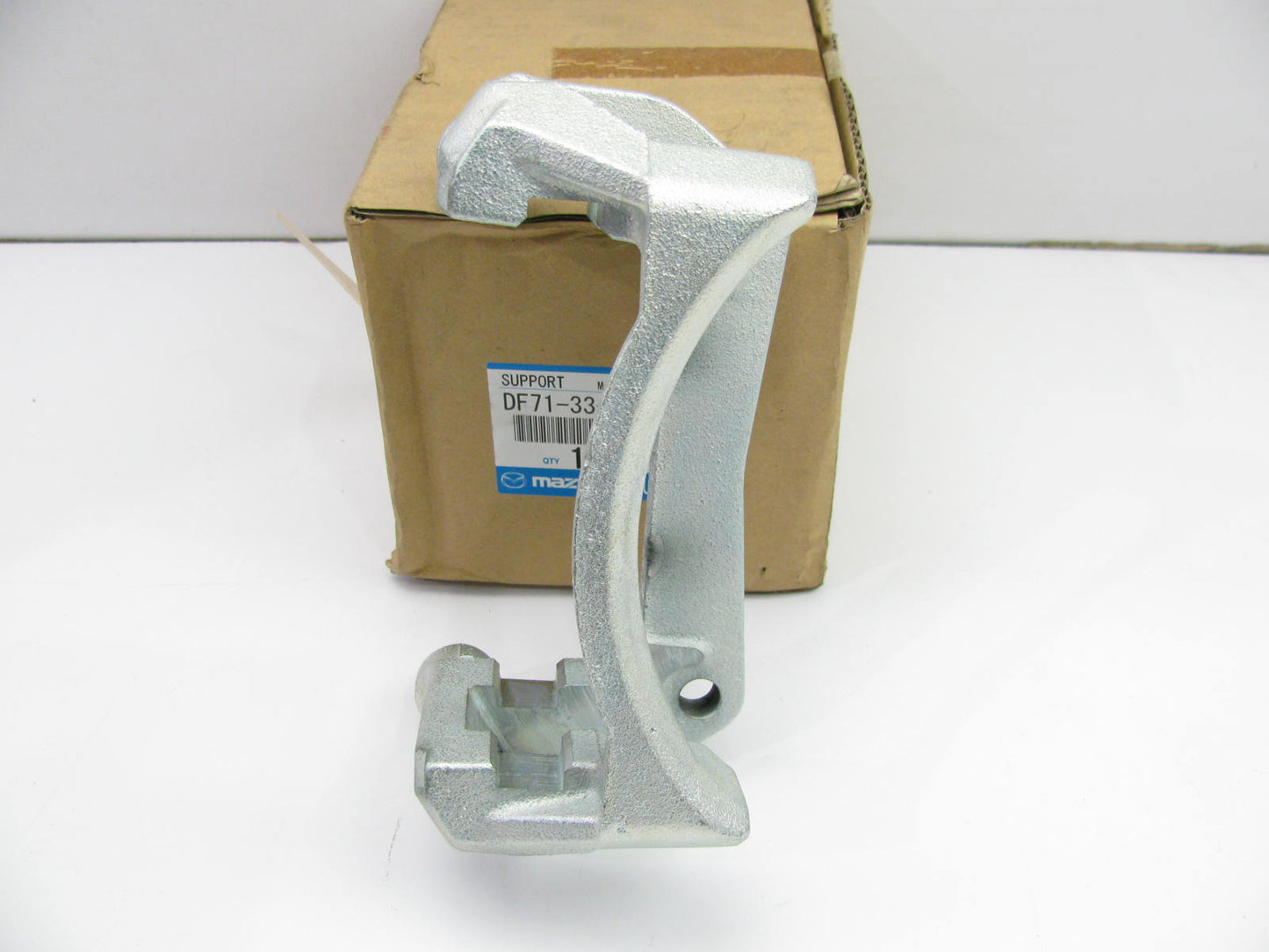 New OEM Front Caliper Bracket DF71-33-281 For 2011-2014 Mazda 2