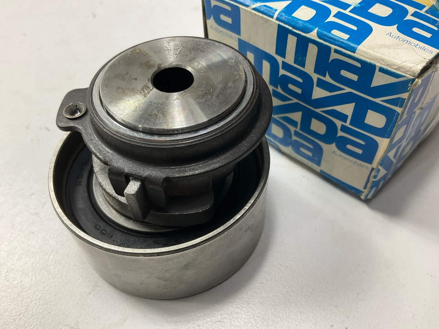 NEW GENUINE OEM Mazda FS05-12-700B Engine Timing Belt Tensioner