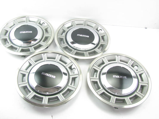 (x4) NOS OEM Mazda  626 1981-1982 13'' Hubcaps G00137190