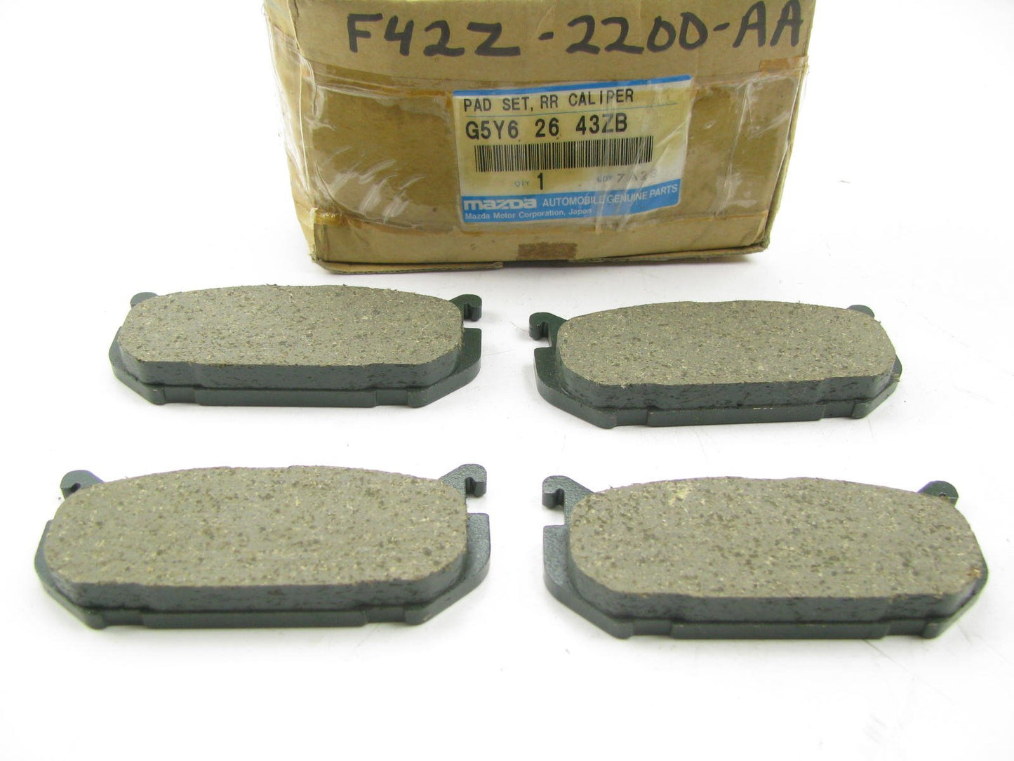 NEW GENUINE REAR Disc Brake Pads OEM For Mazda G5Y62643ZB