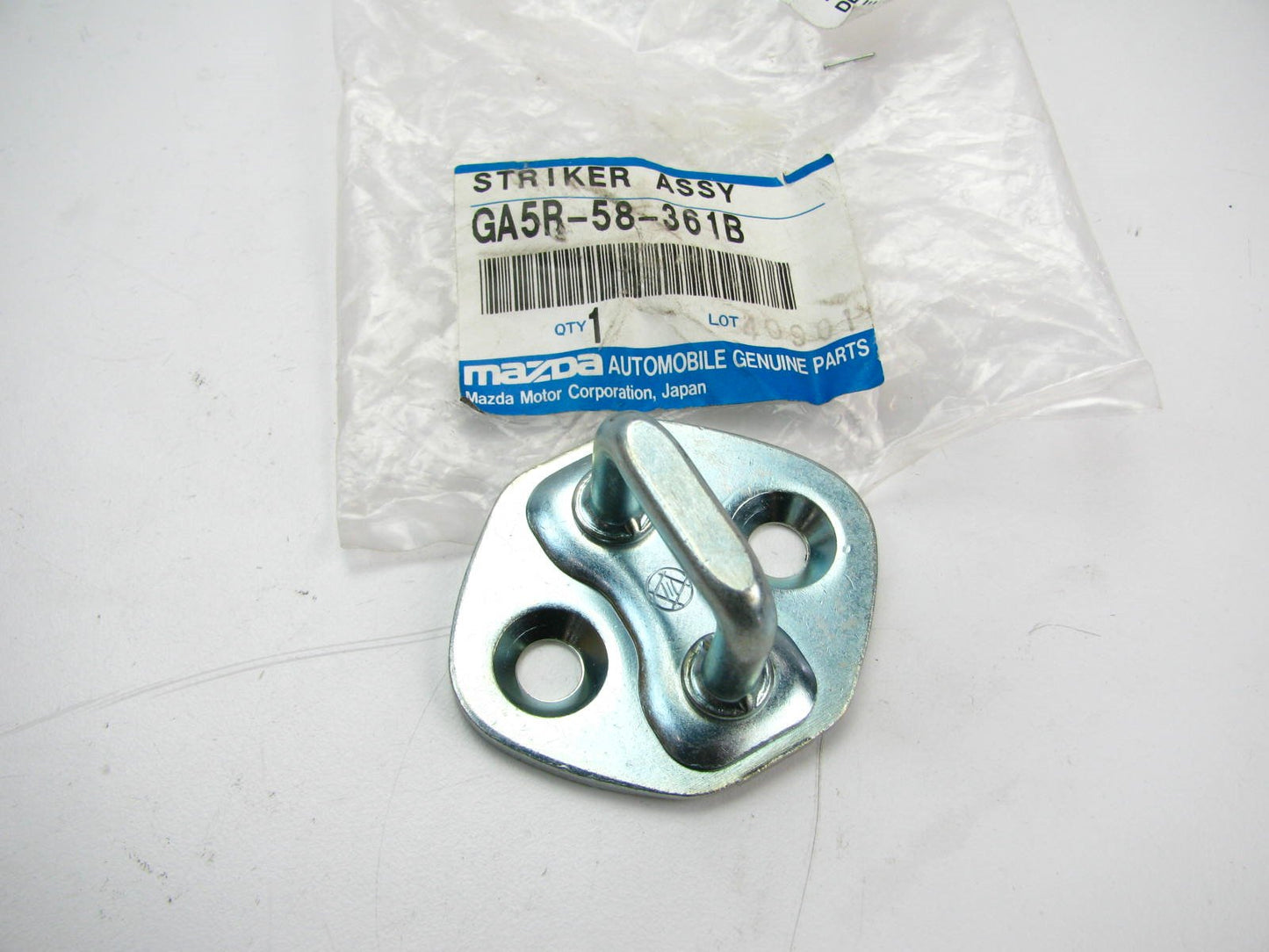 New - Genuine Front Door Lock Striker Plate OEM 1998-2006 Mazda 626, 00-06 MPV