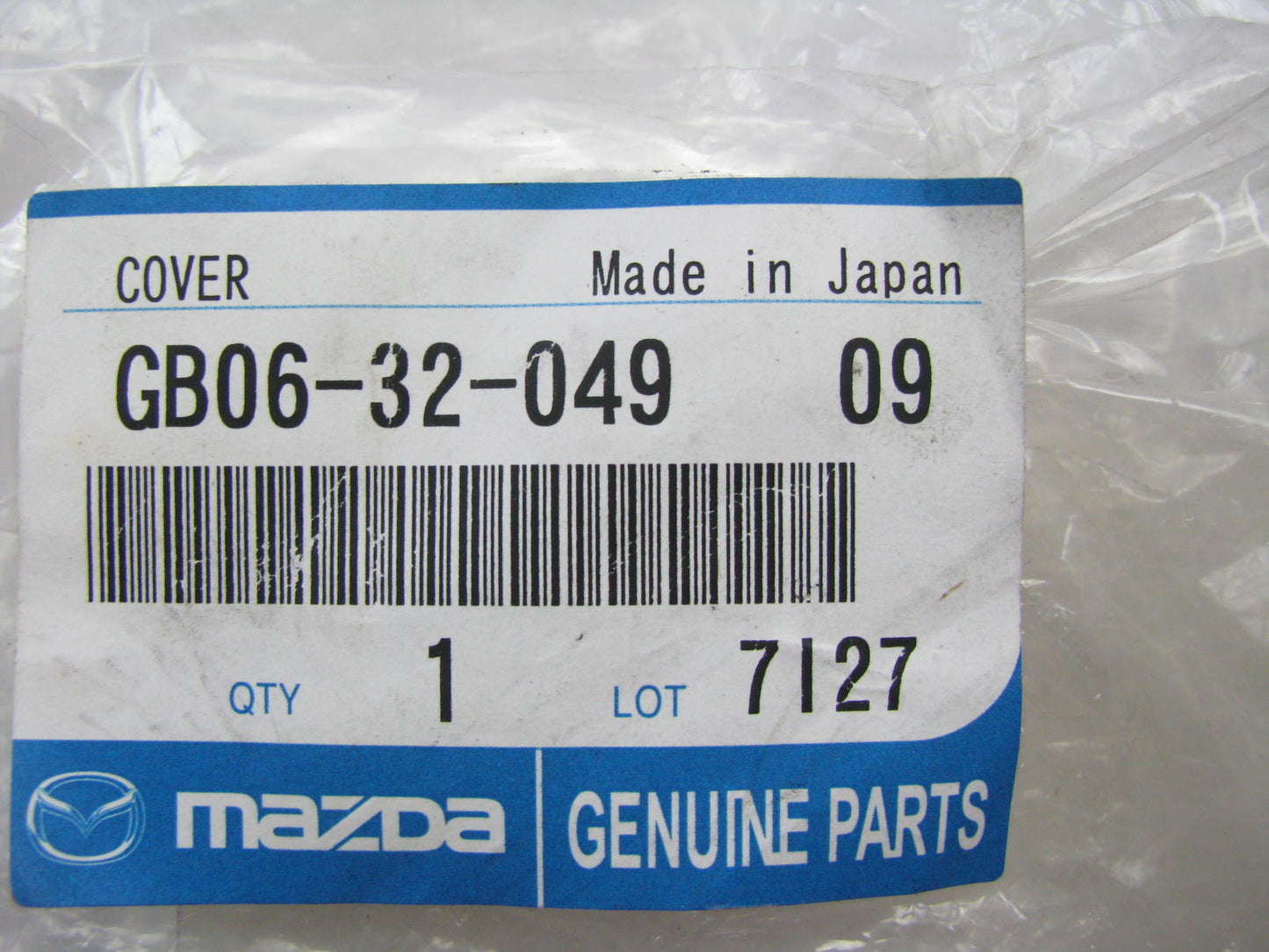 New OEM Mazda Rear Steering Cover Trim 1986-1989 B2200, B2600 GB063204909