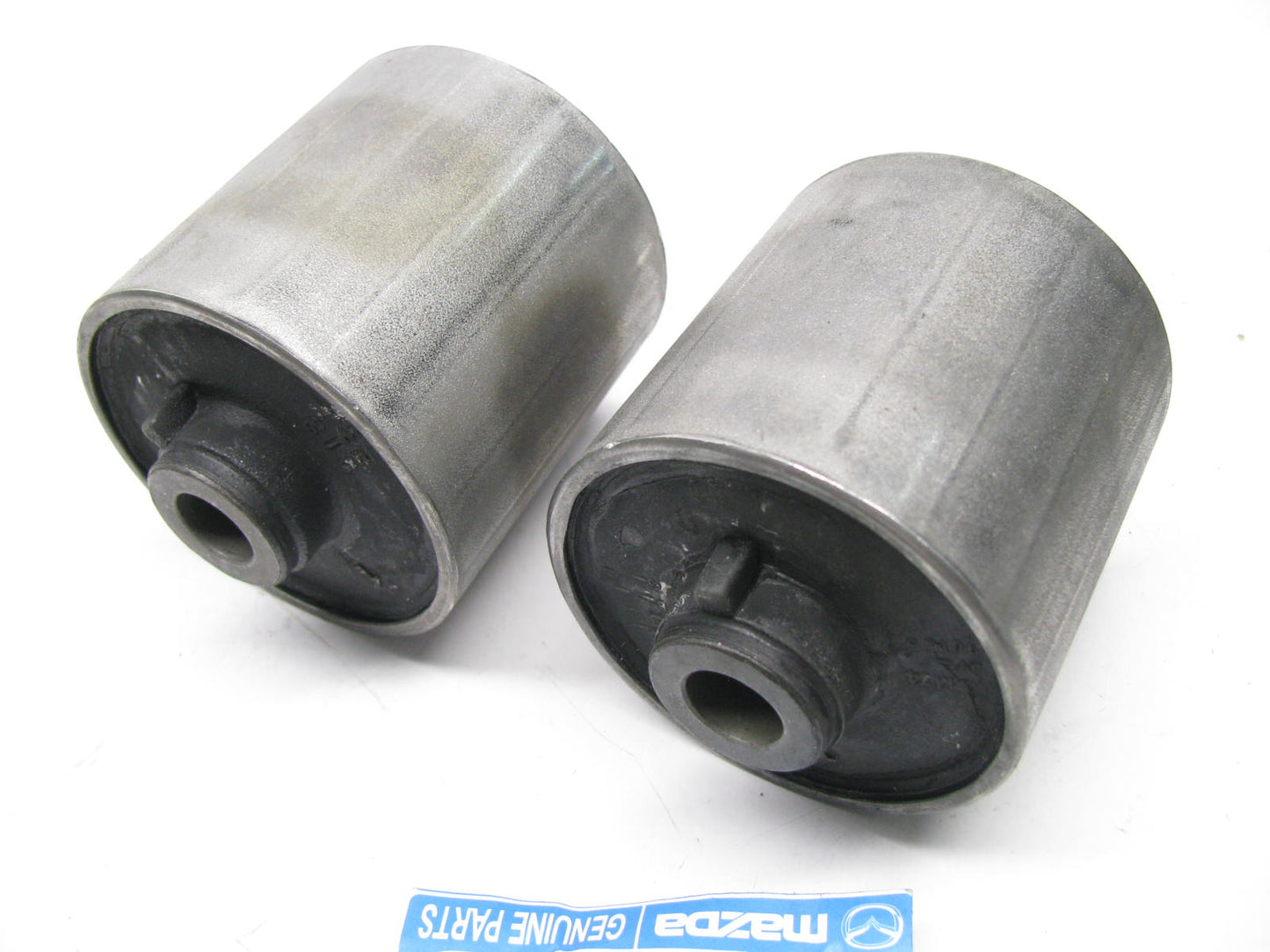 (2) NEW - OEM Mazda GR1A34460 Control Arm Bushings - Front Lower Rearward - PAIR