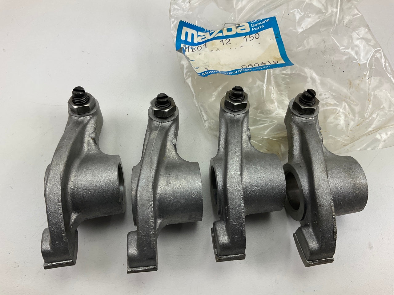 (4) OEM Mazda HE01-12-150 Exhaust Rocker Arms