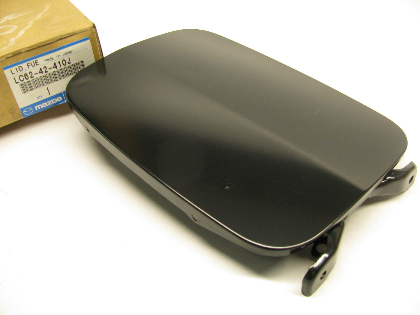NEW - OEM Mazda LC62-42-410J Fuel Filler Gas Cap Door Lid For 2000-2006 MPV
