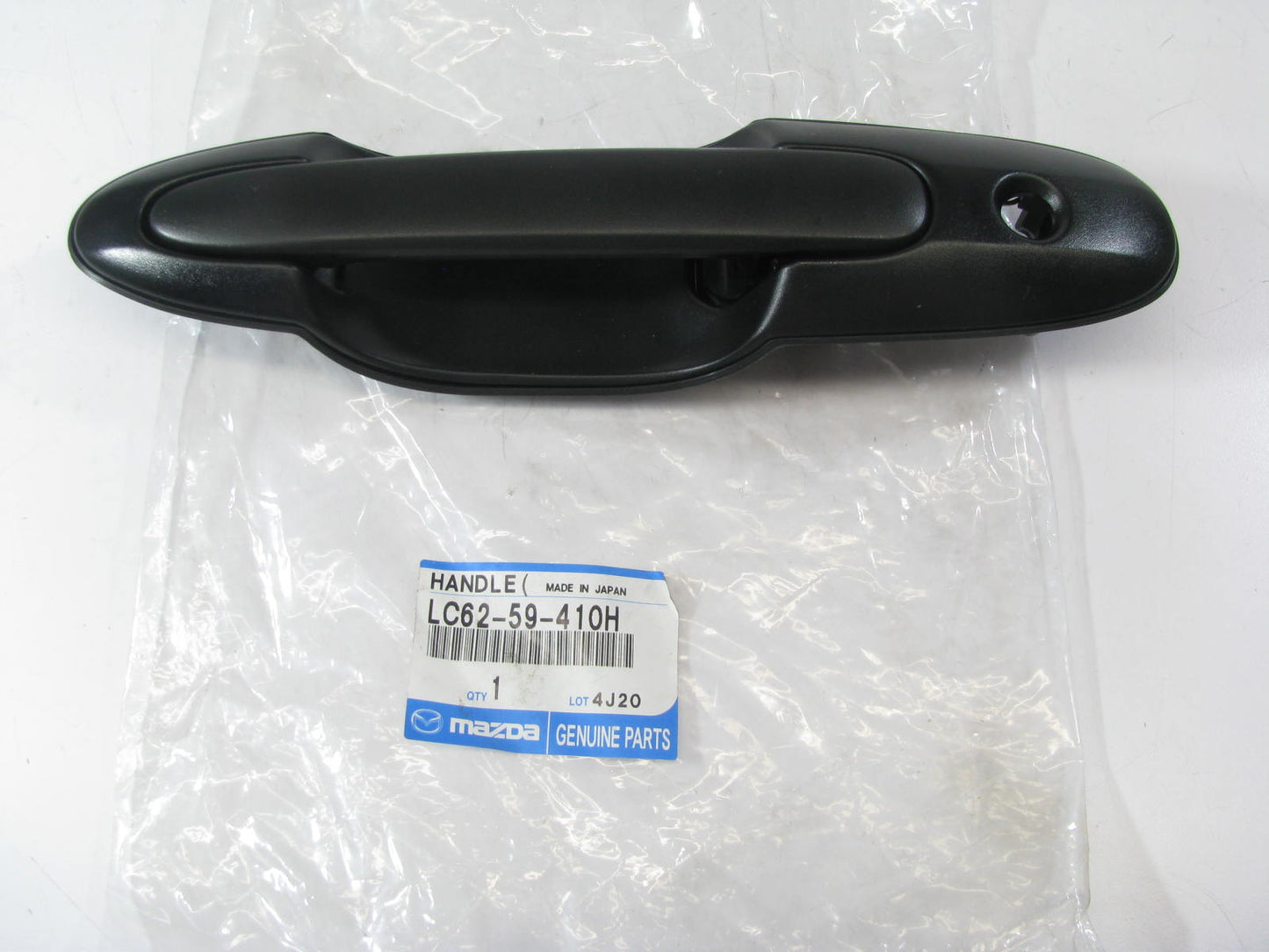 New Genuine OEM Left Exterior Door Handle Mazda 00-01 MPV LC62-59-410H Textured