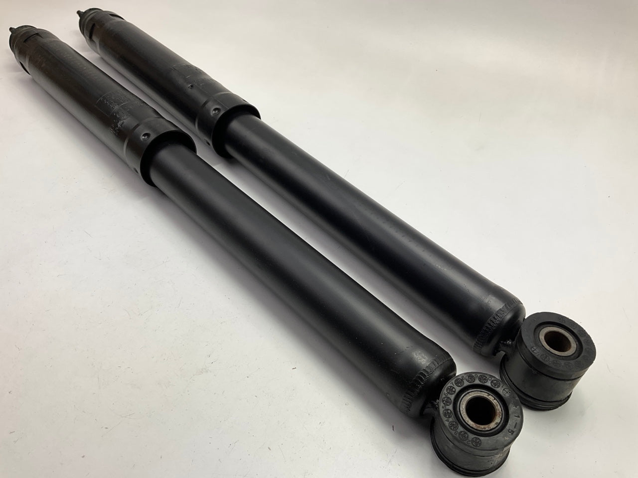 (2) NEW GENUINE OEM Mazda ZZ24-28-700 Rear Shock Absorbers