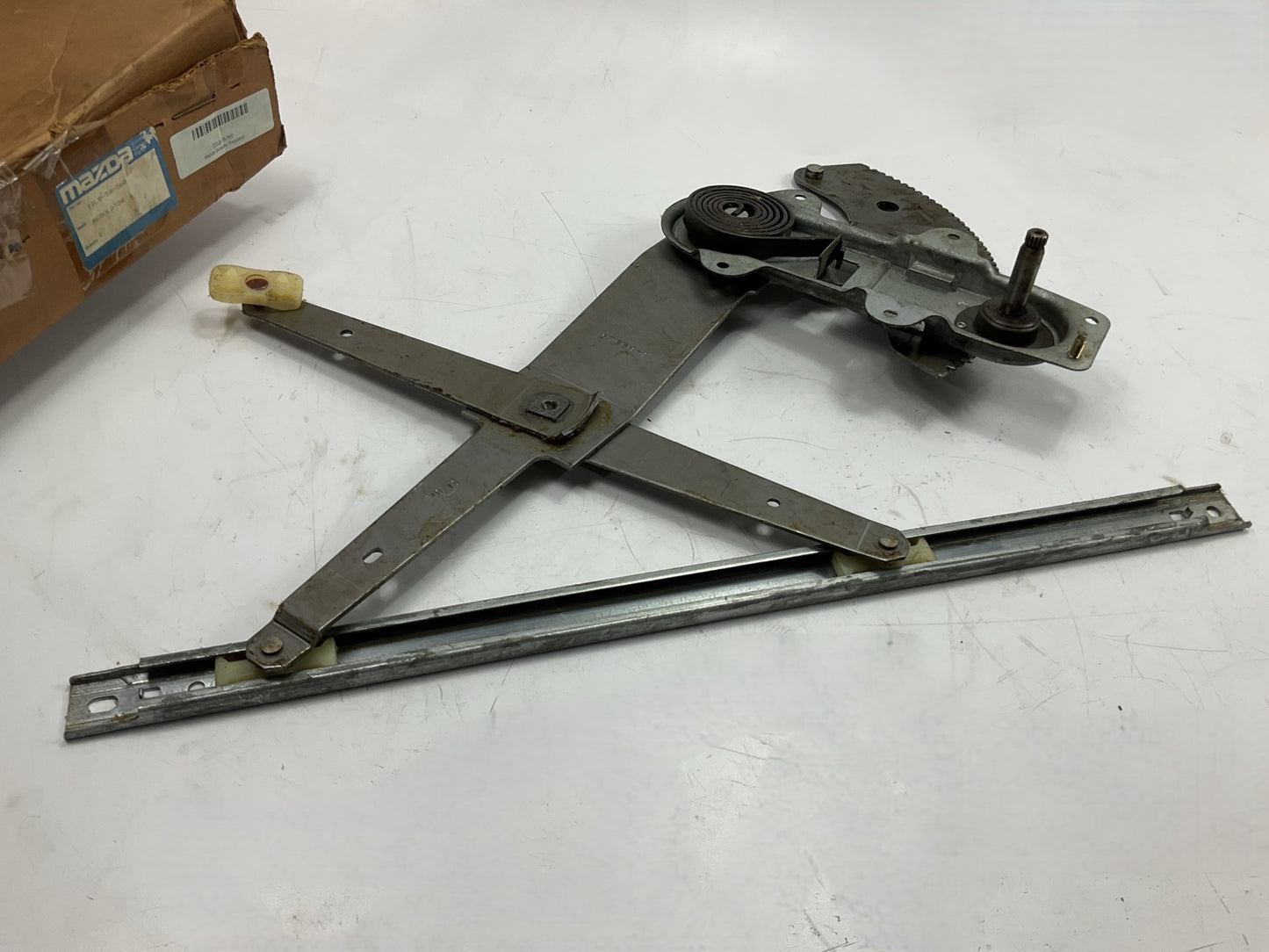 Mazda ZZL0-58-560 Right Manual Window Regulator - 1991-1994 Mazda Navajo 2-door