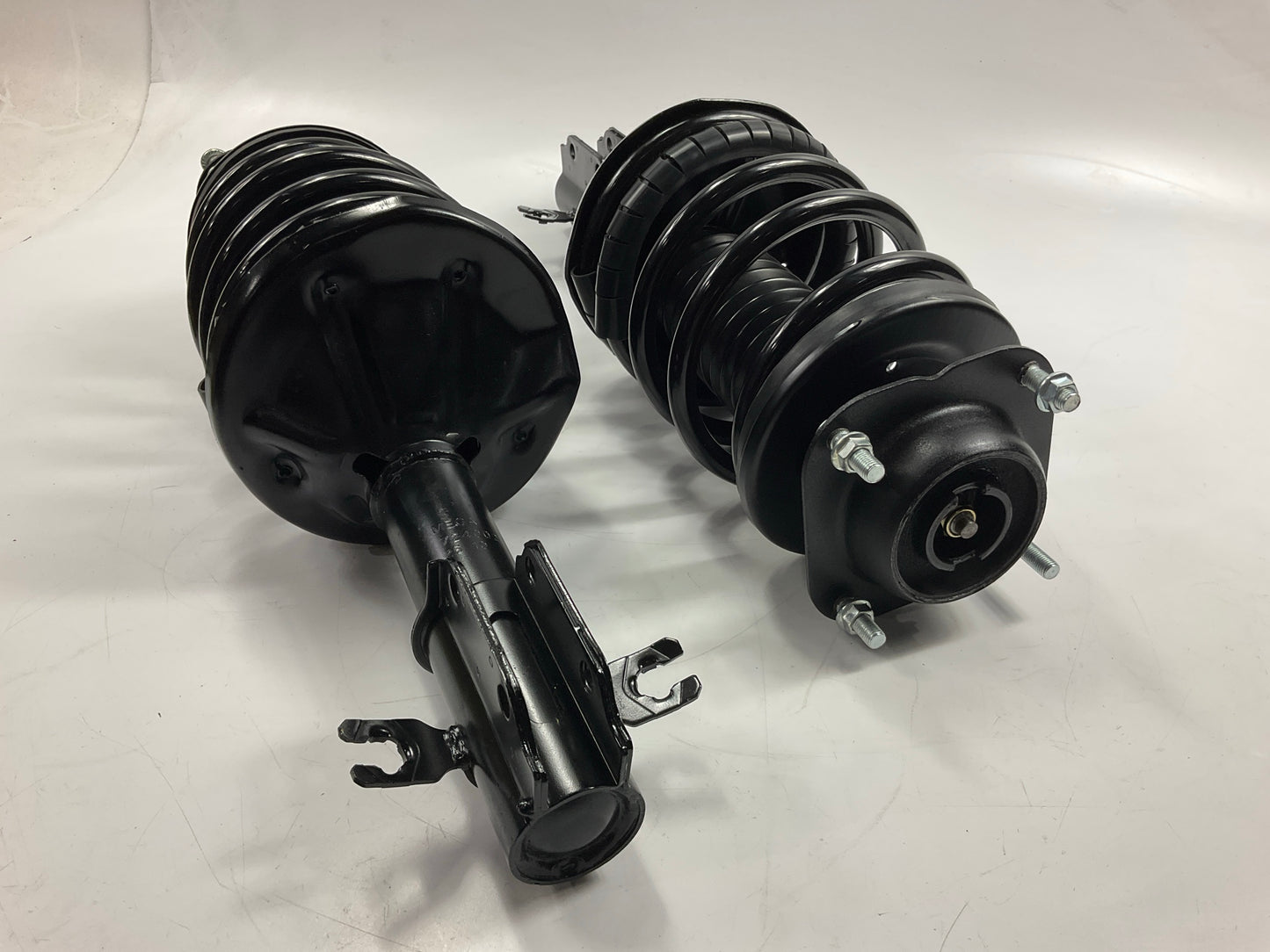 (2) Mega 724002 Suspension Strut And Coil Spring Assembly, Front