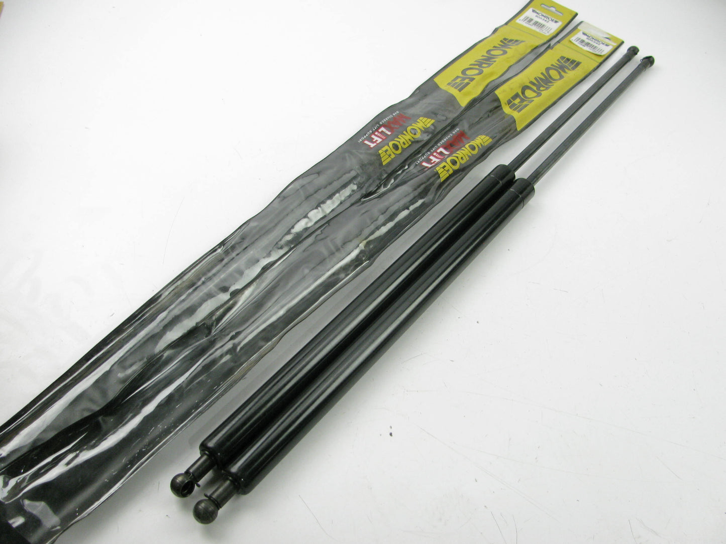 (2) Monroe 900342 Universal Lift Support Shock Strut Arms 16.38'' Comp., 28'' Ext.