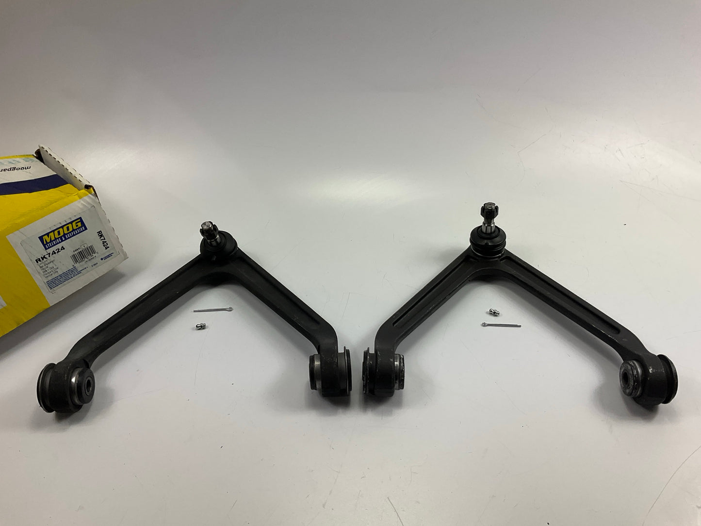 (2) Moog RK7424 Suspension Control Arm And Ball Joint Assembly, Front Upper