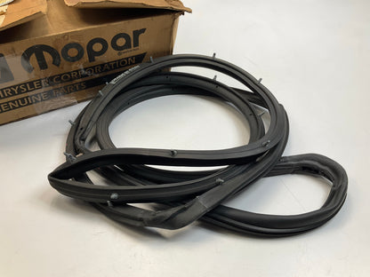 NOS OEM Mopar 4756663 Rear Door Mounted Weatherstrip Rubber Seal, On Door
