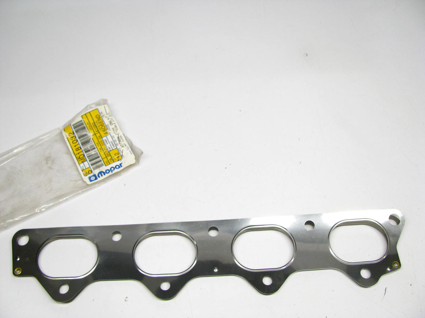 NEW - OEM MD181032 Exhaust Manifold Gasket