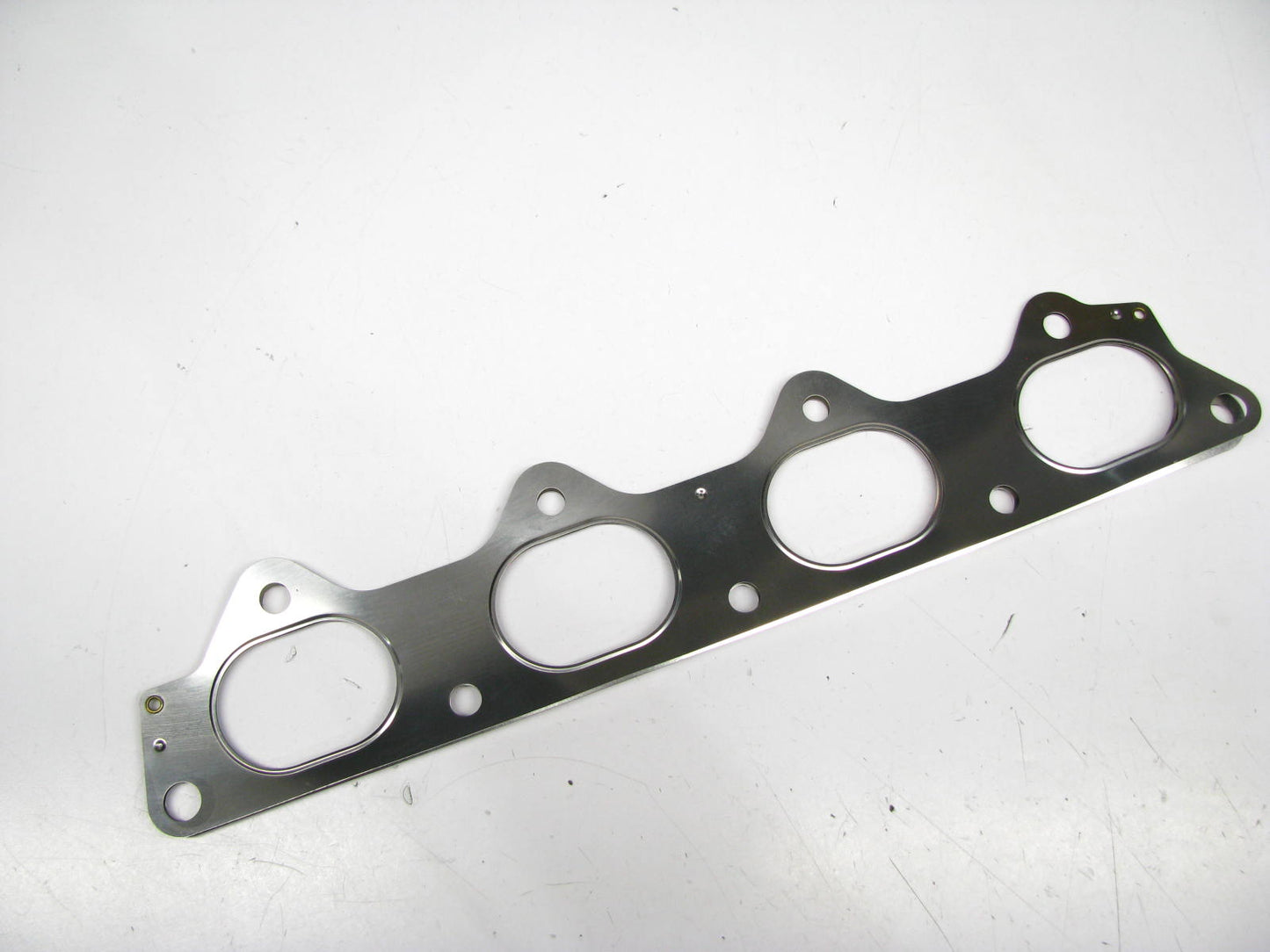 NEW - OEM MD181032 Exhaust Manifold Gasket