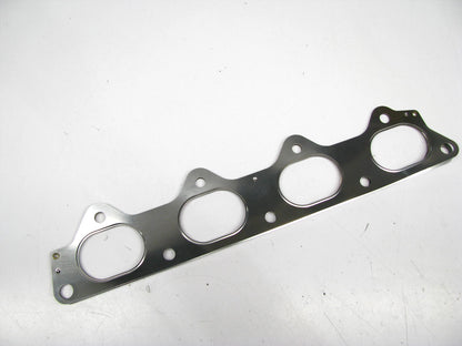 NEW - OEM MD181032 Exhaust Manifold Gasket