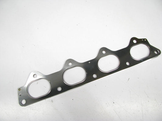 NEW - OEM MD181032 Exhaust Manifold Gasket