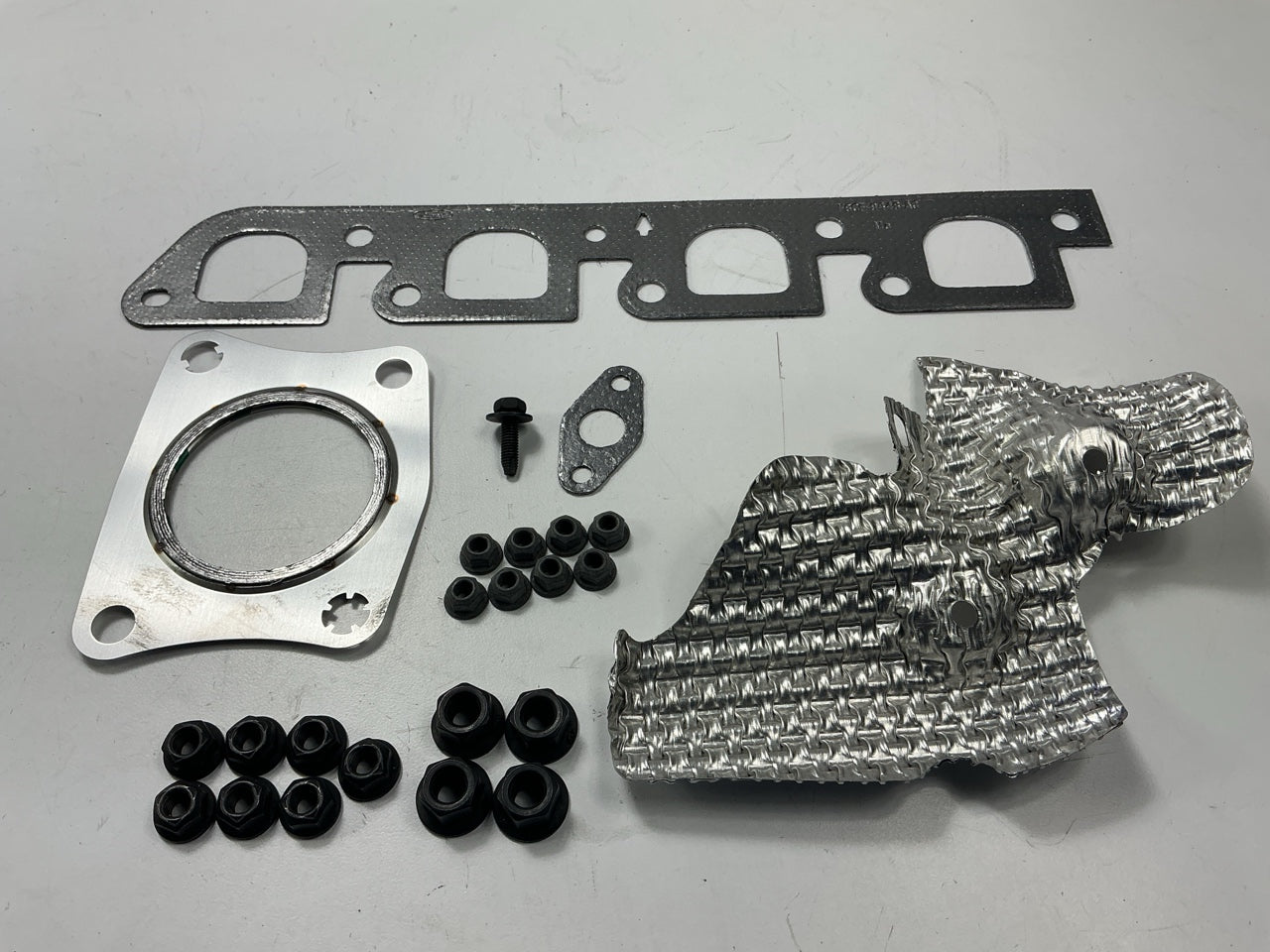 Missing 1 Nut - 1998 ESCORT 2.0L SPLIT PORT INDUCTION PCV Freezing Service Kit