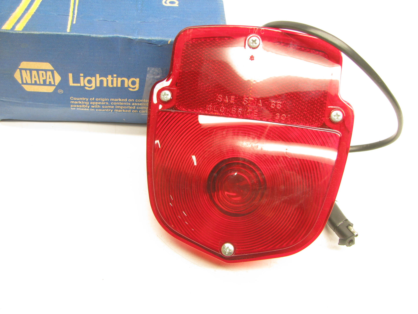 Napa 588-2659 Tail Light Lamp W/ License Lamp For 1955-61 Ford Trucks - 4038