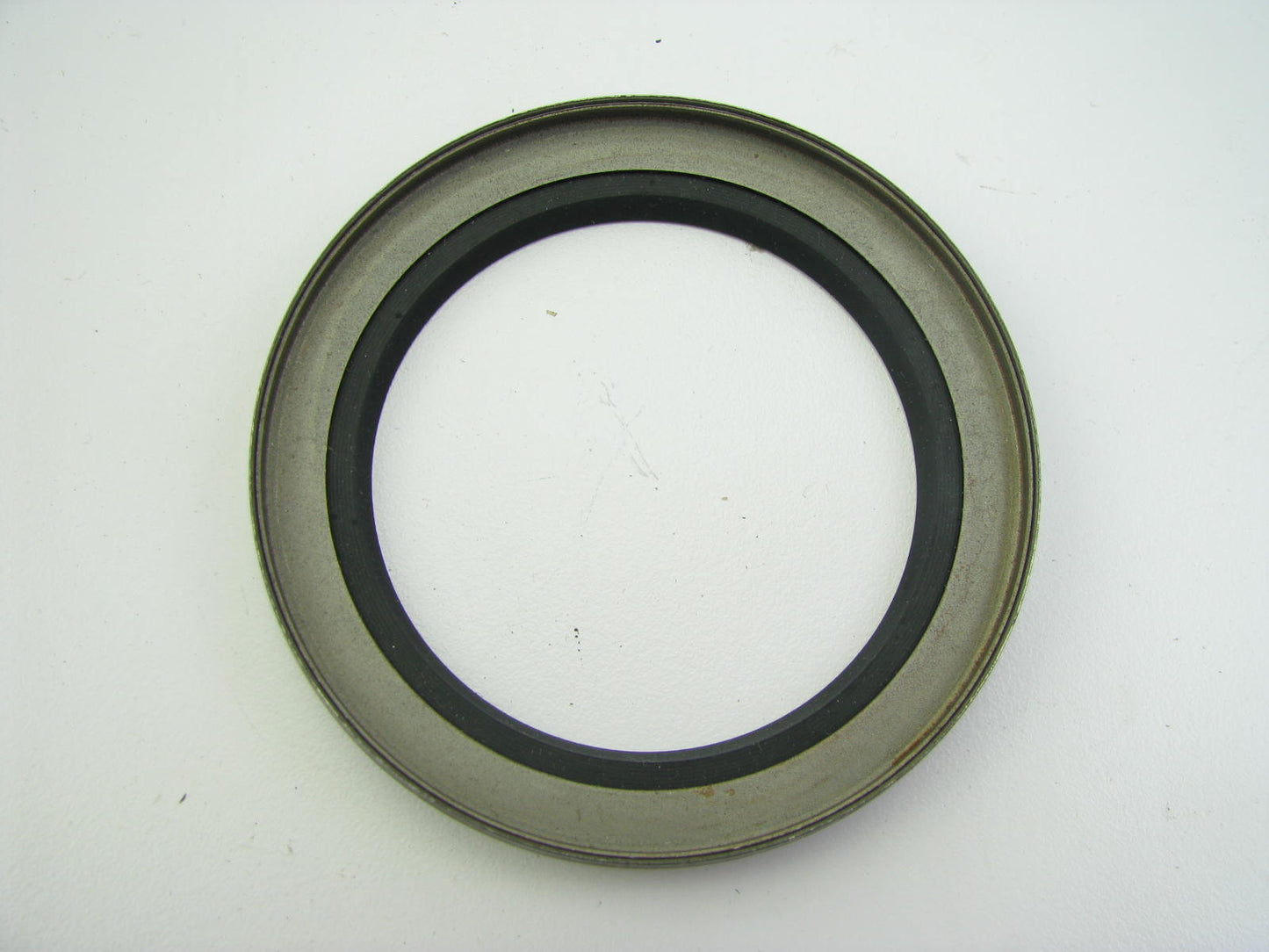National 203034 Wheel Seal - 3.000'' OD X 1.875'' ID X 0.437'' Wide