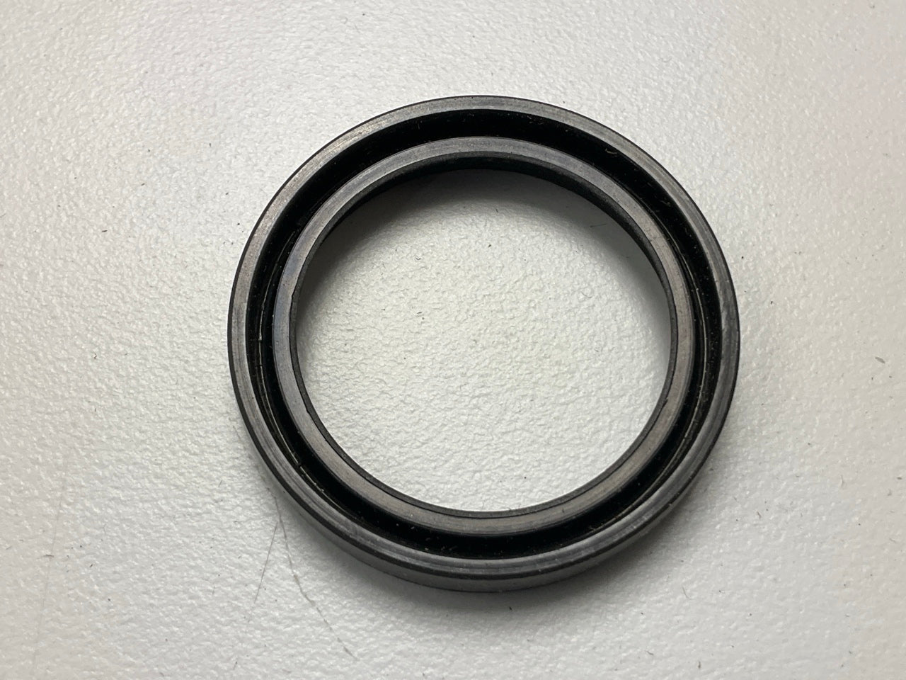 National 340815 Wheel Oil Seal - 1.505'' OD X 1.125'' ID X 0.250'' Wide