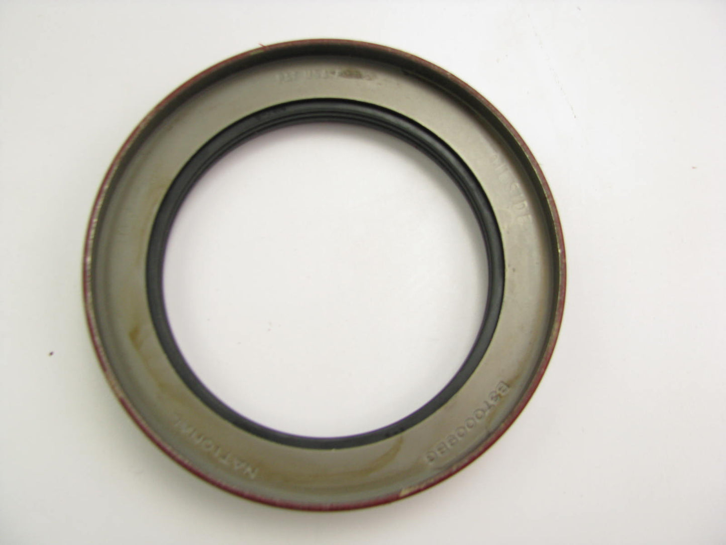 National 370009A Wheel Seal - 5.507'' OD X 3.937'' ID X 0.937'' Wide