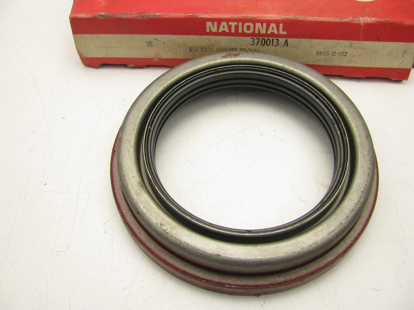 National 370013A Oil Seal - 5.006'' OD X 3.3125'' ID X 0.9375'' Wide